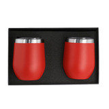 A set of two red insulated cups with stainless steel rims, displayed in a black gift box.