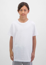 A white short sleeve tee for kids, displayed on a model standing against a neutral background.