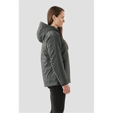 A women's thermal shell jacket in dark grey, featuring a hood and a fitted design, with a branding logo.