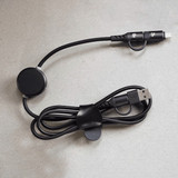 A black charging data cable with a unique design, featuring a circular attachment and a sturdy braided cord.