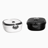 A lunch box set featuring a black and a white container, each with a secure lid and branding.