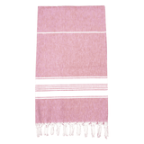 A pink and white Turkish towel with fringed edges and a subtle striped pattern, featuring a logo.