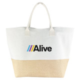 A large tote bag in cream and jute, featuring a logo on the front.