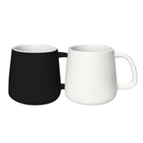 A coffee mug set featuring a black and a white mug, both with a rounded shape and a handle.