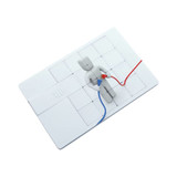 A white puzzle-themed credit card flash drive with a 3D figure connected by red and blue wires. It features a logo.