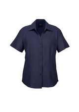 A navy short sleeve button-up shirt with a collar and a front button placket, featuring a logo.