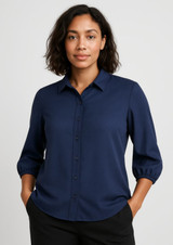 A navy blue women's blouse with 3/4 sleeves, featuring a button-down front and a collar.