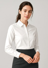A white long sleeve button-up shirt for women, featuring a classic collar and a simple design.
