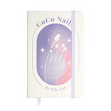 A white pocket notebook with an illustration of a hand and nail polish against a gradient background. It has a logo.