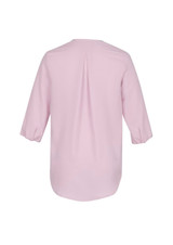 A light pink women's longline blouse with three-quarter sleeves and a central pleat at the back.