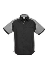 A short sleeve button-up shirt in black and grey with contrasting trim and a chest pocket. It features a logo.