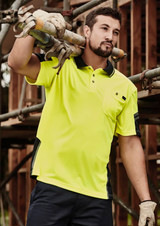 A bright yellow short sleeve polo shirt with navy accents and a pocket, featuring a logo.