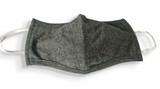 A grey 100% cotton face mask with ear loops, featuring a structured design and a simple logo.