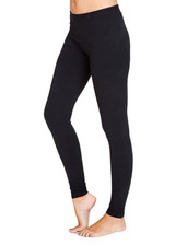 A pair of black women's cotton spandex full-length leggings displayed on a model. The leggings have a fitted silhouette.