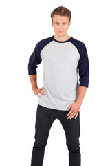 A unisex 3/4 sleeve raglan T-shirt in grey with navy sleeves, featuring a logo on the chest.