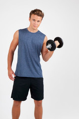 A man holding a dumbbell wears a navy blue sleeveless tee and black shorts. The shirt has a logo.