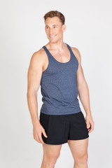 A man wearing a navy blue athletic T-back singlet, paired with black shorts. The singlet features a logo.