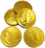 Six gold chocolate coins, featuring a mesh bag, each embossed with a design on both sides.