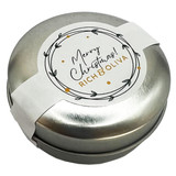 A silver tin featuring a festive label, containing chewy mints, elegantly designed for Christmas.