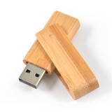 A bamboo USB flash drive in natural wood color, featuring a removable cap and metallic connector.