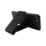 A black phone stand designed to hold a smartphone upright, featuring a simple, foldable design.