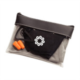 A clear toiletry bag containing an eye mask, earplugs, and a grey cloth, with a black zip closure and logo.