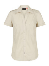 A beige ladies short sleeve button-up shirt with a collar and two chest pockets, featuring a logo on the label.