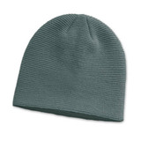 A green knitted beanie with a textured pattern and a logo on the side.
