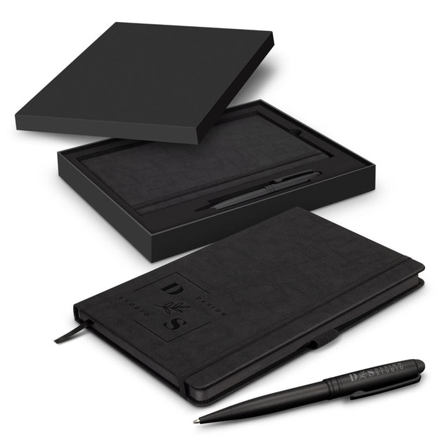 A black writing set featuring a notebook and pen, presented in a sleek black gift box with a logo.