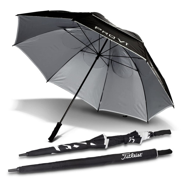 A black and grey double canopy umbrella with a sleek design and a logo. It is shown both open and folded.