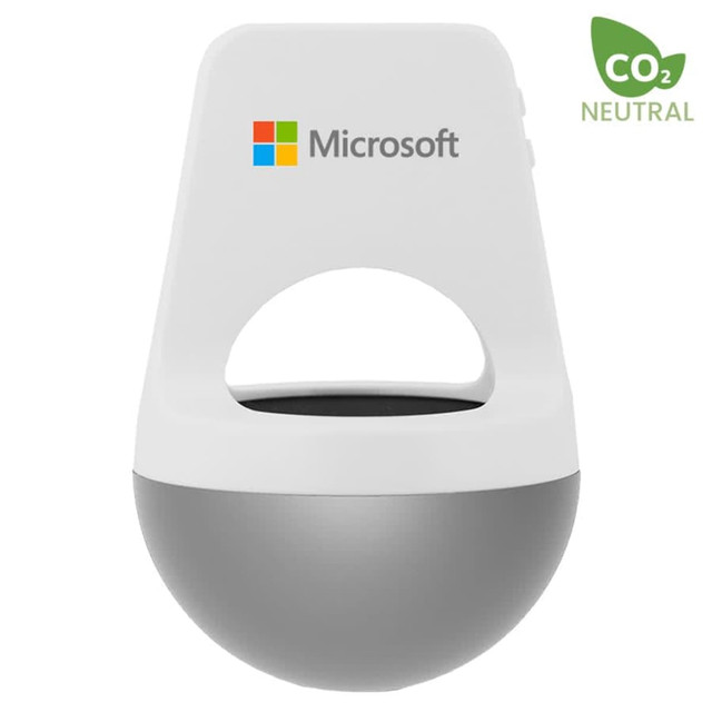 A wireless speaker in silver and white with a rounded design, featuring a small handle and a logo.