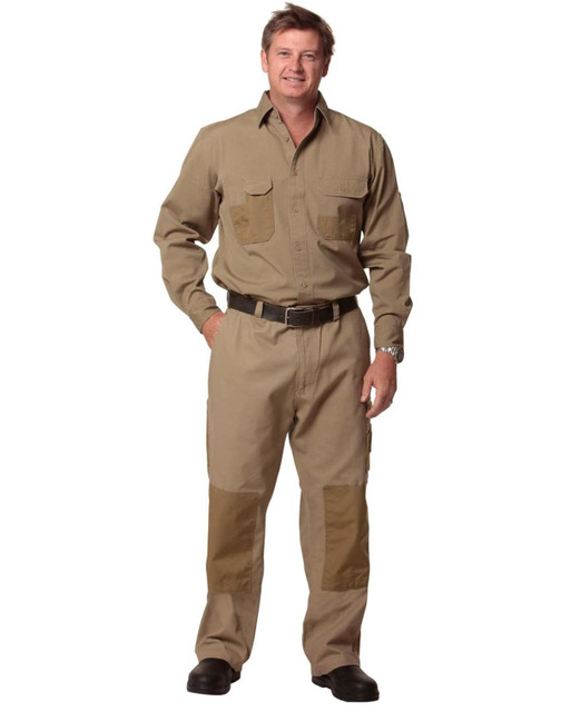 A long sleeve work shirt in khaki with two front pockets, featuring reinforced patches on the elbows.