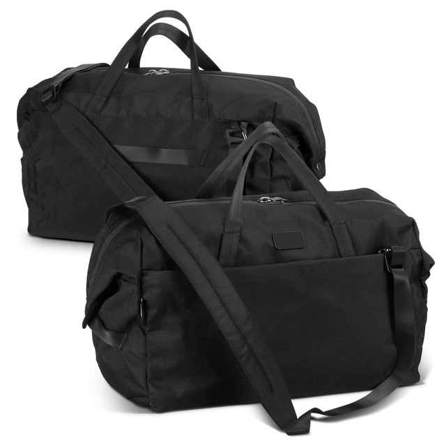 A black duffle bag with dual handles and a detachable shoulder strap, featuring a logo.