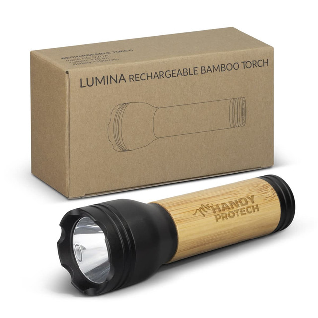 A bamboo torch with a black top, displayed against its packaging. The product includes a logo on the body.