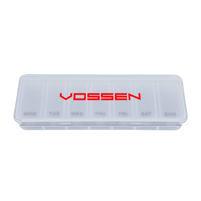 A transparent weekly pill box with compartments for each day, featuring a red logo.