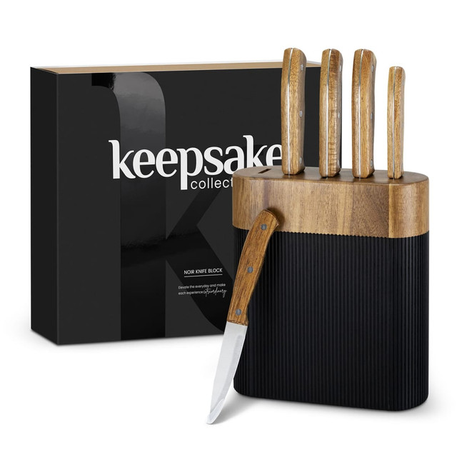 A knife block featuring a sleek black design with wooden handles and a slim knife included, alongside a branded box.