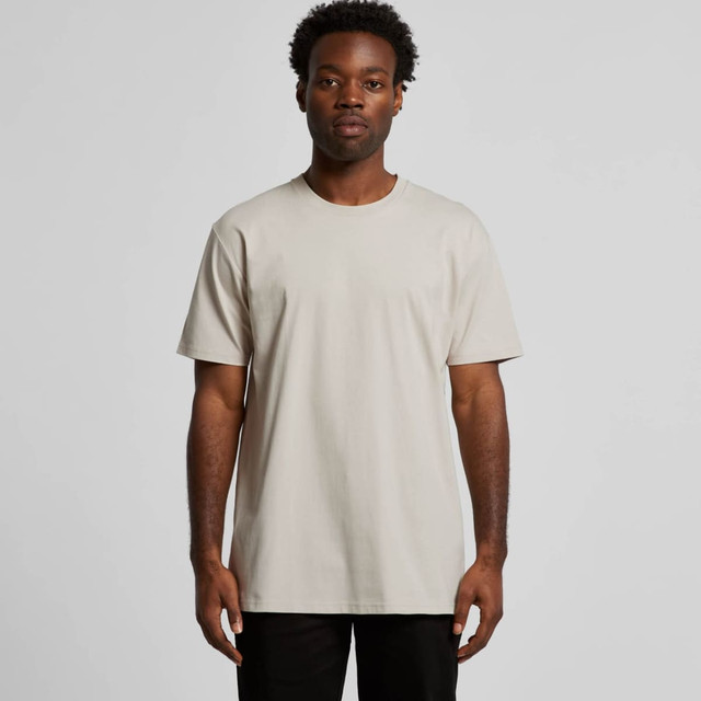 A light beige T-shirt made from soft fabric, featuring a simple design and a round neckline. It has a logo.