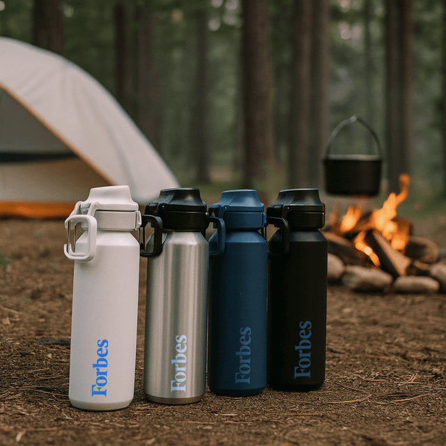 A drink bottle collection featuring white, silver, navy, and black bottles, each with a logo, set in a camping environment.