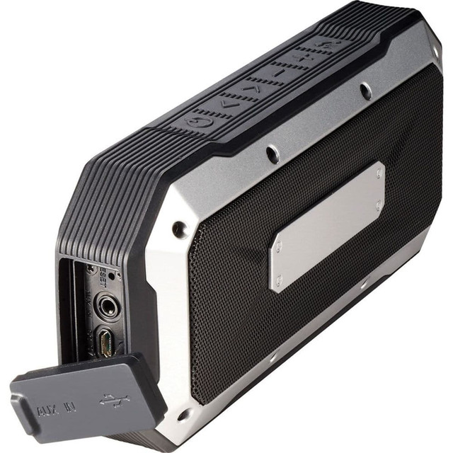 A grey and black waterproof outdoor Bluetooth speaker with input ports and a protective cover. It features a logo on the side.