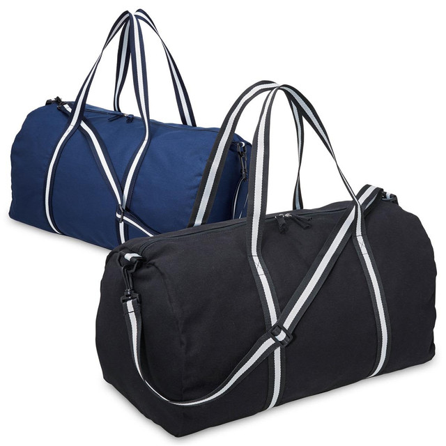 A canvas duffle bag in black and one in navy blue, both featuring contrasting striped handles and a logo.