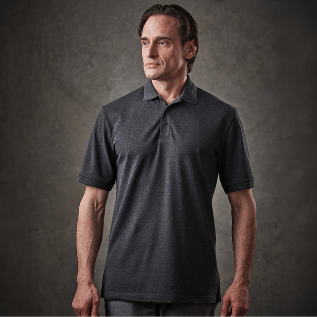 A man's charcoal grey polo shirt with a classic collar and short sleeves, featuring a logo on the chest.