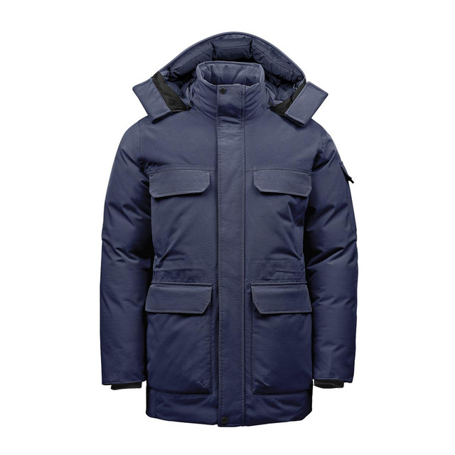 A navy blue Men's Denali Parka featuring multiple pockets and a hood, complete with a logo on the sleeve.