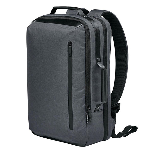 A sleek grey backpack with padded straps and multiple compartments, featuring a logo on the side.