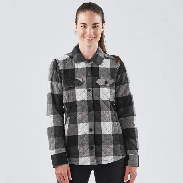 A women's black and grey plaid shacket with a button-up front and two chest pockets, featuring a logo.