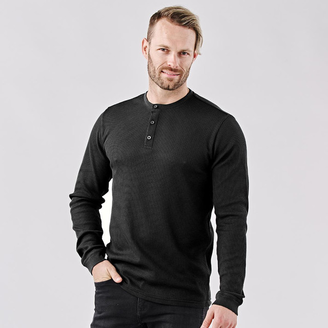 A black men's Henley shirt with long sleeves and a buttoned neckline, featuring a small logo.