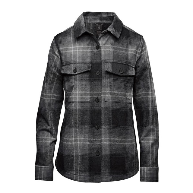 A women's shacket in a black and grey highland plaid pattern, featuring a button-up front and two chest pockets.