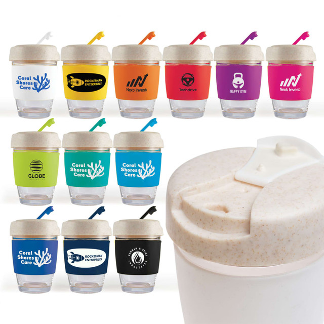 A reusable coffee cup in various colors with a silicone band, featuring different logos and a straw.