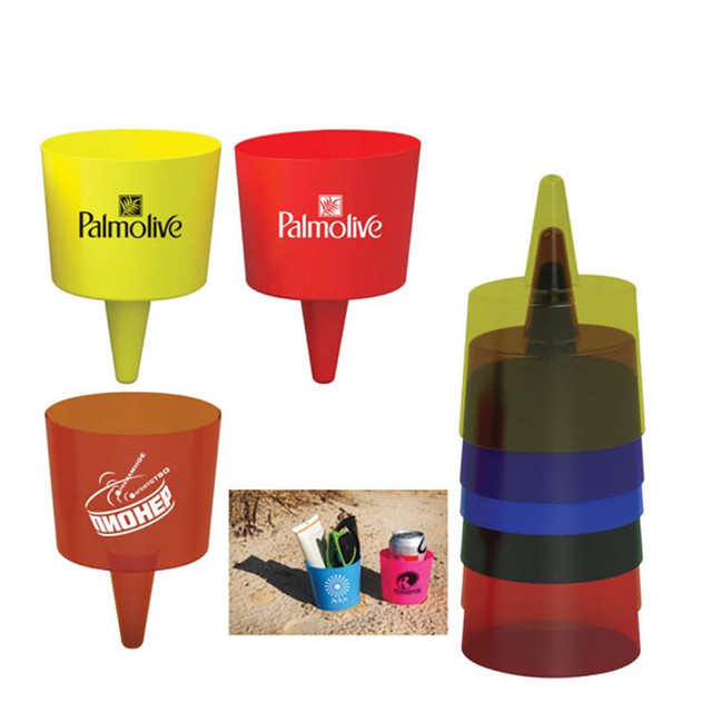 A set of plastic cups in various bright colours, including yellow, red, orange, green, and black, featuring logos.