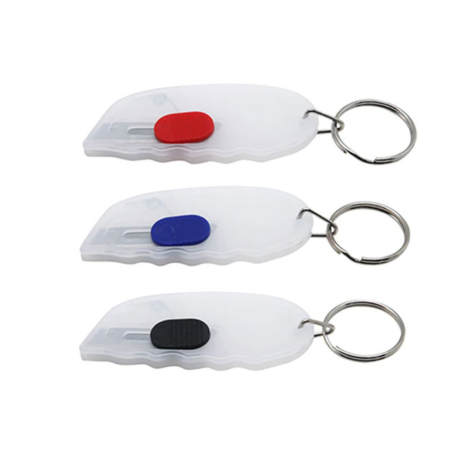 A set of three Mini Cutter Key Rings in white, featuring red, blue, and black buttons, attached to metal key rings.