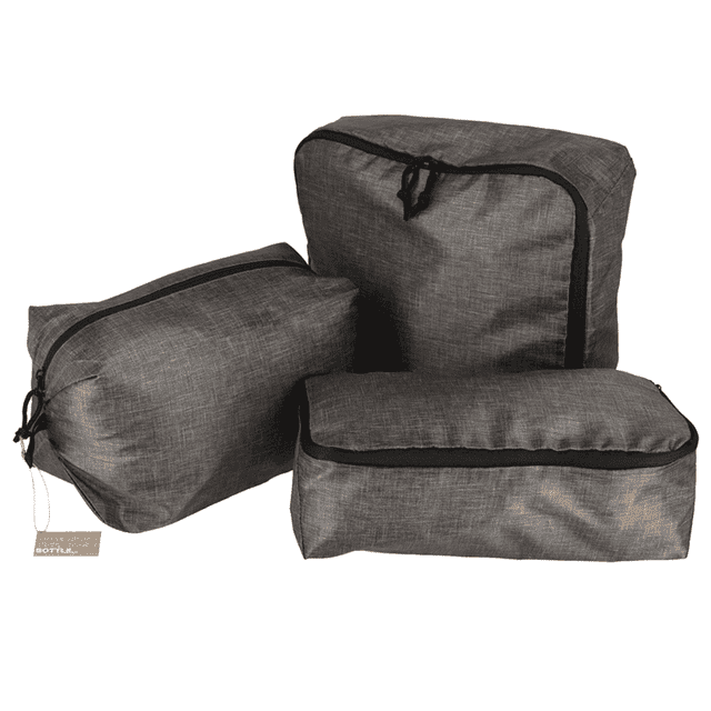 A set of three black recycled packing cubes in various sizes, featuring zippers and a textured pattern.